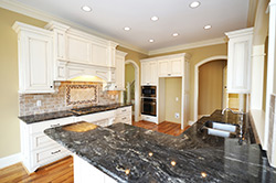 Black Granite kitchen white cabinets - Talladega Talladega